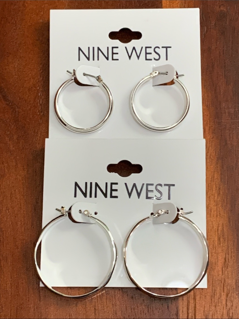NWT Nine West 2 pair set of silver tone hoop earrings